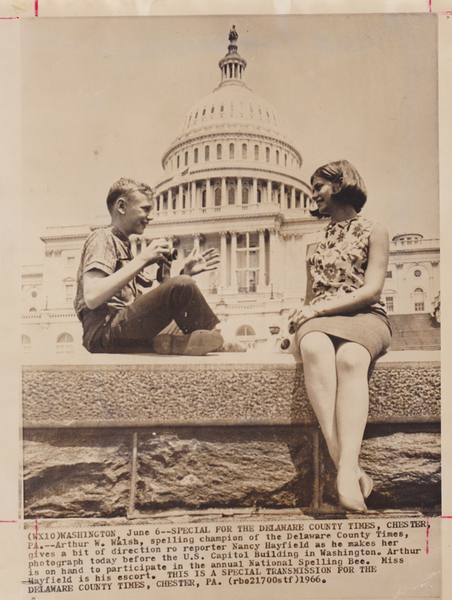 I am a working reporter! Interviewing a spelling-bee contestant in front of the Capital building.