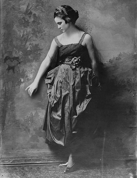 A cinemagraph of a girl stroking wallpaper. A cinemagraph of a girl stroking wallpaper.